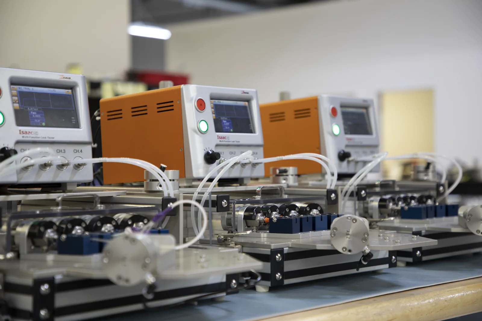 Three Zaxis Isaac HD Modular Production Air Leak Testers, running a variety of leak tests - Pressure Decay, Vacuum Decay, Mass Flow, Pressure Cracking, Burst Pressure, Chamber Tests, etc
