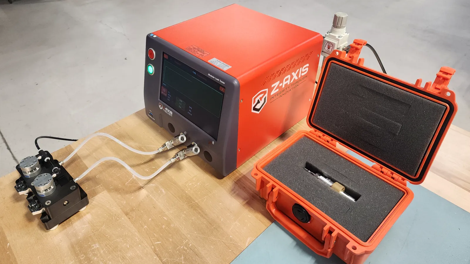 Z-series leak tester connected to a multi-position production fixture