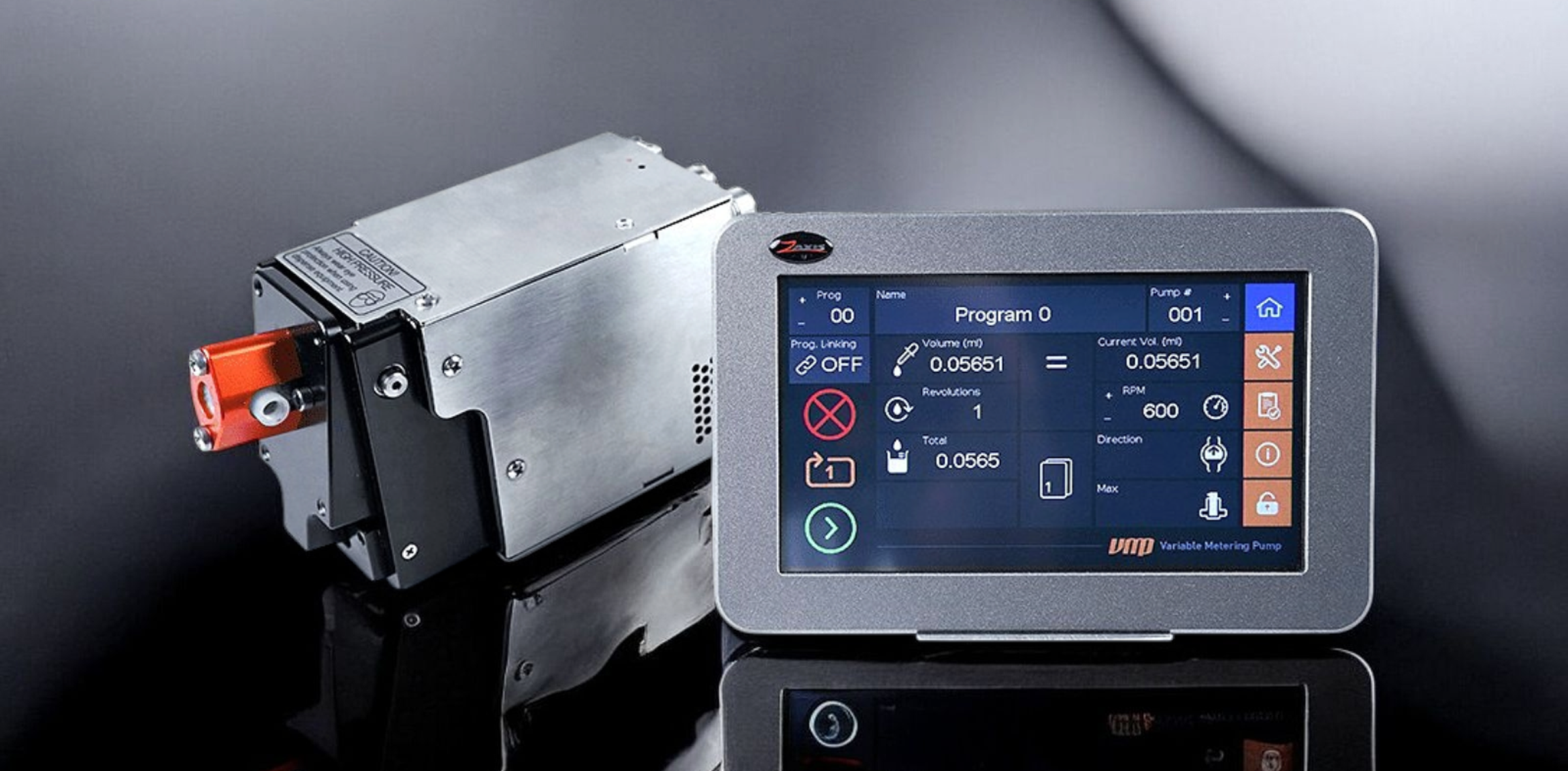 M-Series pump drive and head beside the TSi touchscreen controller in a black studio
